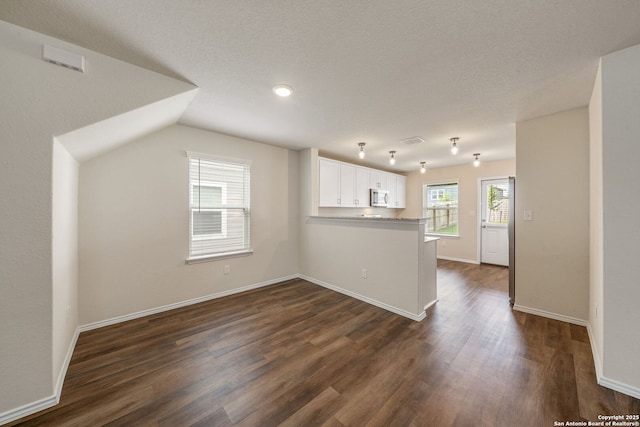13758 Prospector Post, San Antonio, TX 78253 - unfurnished living room featuring dark wood-style flooring, baseboards, and recessed lighting