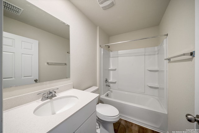 13758 Prospector Post, San Antonio, TX 78253 - bathroom featuring toilet, wood finished floors, vanity, and  shower combination
