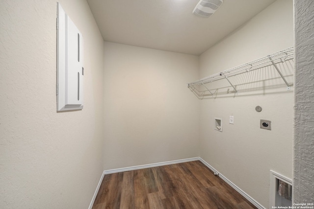 13758 Prospector Post, San Antonio, TX 78253 - laundry area featuring dark wood-style floors, hookup for a washing machine, electric dryer hookup, and baseboards