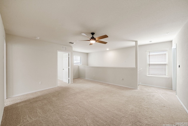 13758 Prospector Post, San Antonio, TX 78253 - empty room with ceiling fan, light carpet, baseboards, and a smoke detector