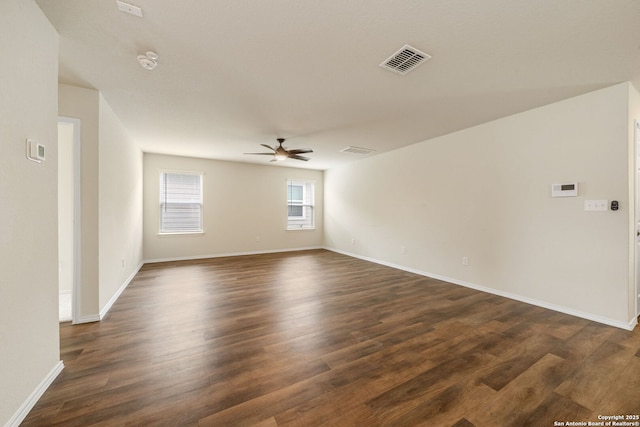 13758 Prospector Post, San Antonio, TX 78253 - empty room featuring a ceiling fan, dark wood-style flooring, baseboards, and a smoke detector