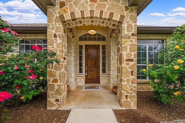 125 Stone Cyn, Fredericksburg, TX 78624 - view of exterior entry with stone siding