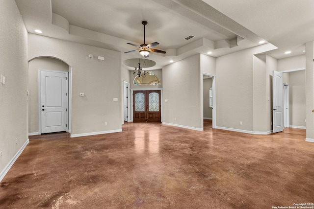 105 Saddle Up, La Vernia, TX 78121 - unfurnished living room featuring finished concrete flooring, ceiling fan, recessed lighting, arched walkways, and baseboards