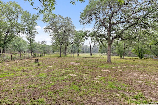 105 Saddle Up, La Vernia, TX 78121 - view of yard with fence