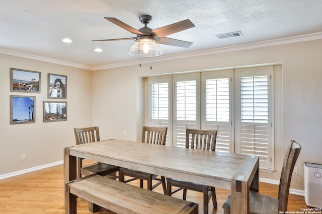 dining space featuring ornamental molding, baseboards, light wood-type flooring, ceiling fan, and recessed lighting
