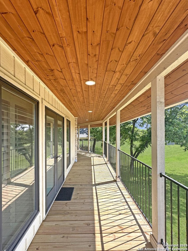 wooden deck with french doors