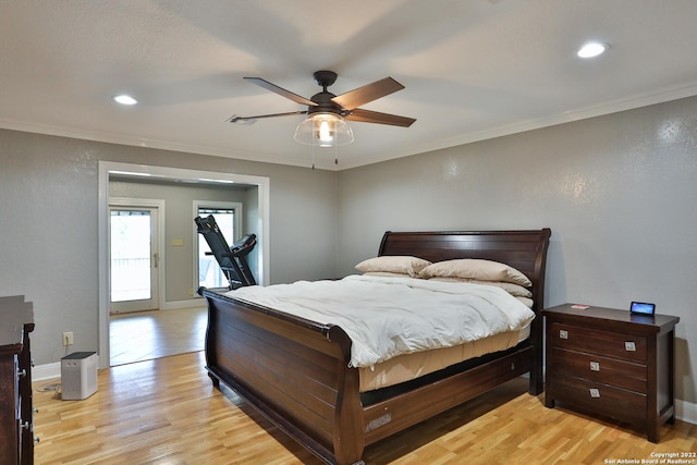 bedroom with crown molding, light wood finished floors, recessed lighting, baseboards, and ceiling fan