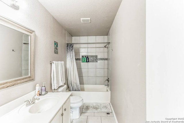 full bathroom with a textured ceiling, tile patterned floors, toilet, vanity, and shower / bath combination with curtain