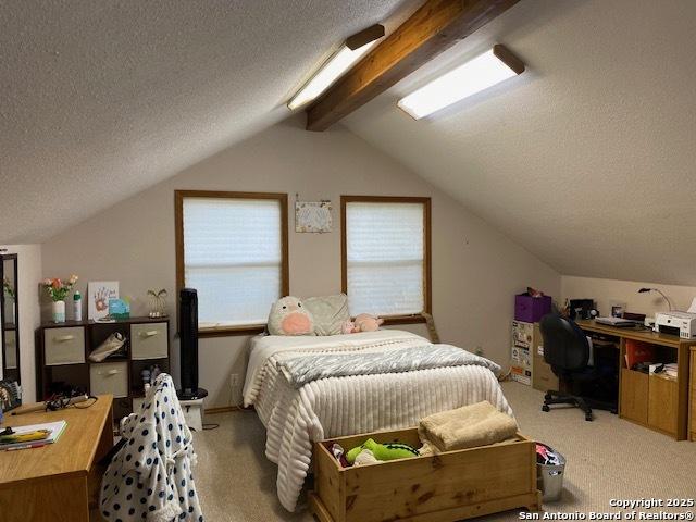 9516 Geronimo Oaks, San Antonio, TX 78254 - bedroom featuring carpet flooring, an office area, and a textured ceiling