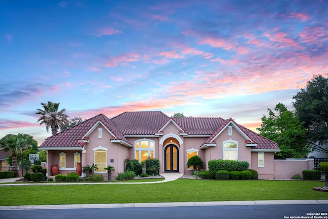 71 Three Lks, San Antonio, TX 78248 - mediterranean / spanish home featuring a front yard, stucco siding, and a tiled roof
