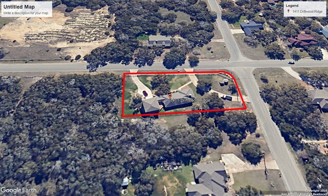 aerial map of property and surrounding area featuring property parcel outlined