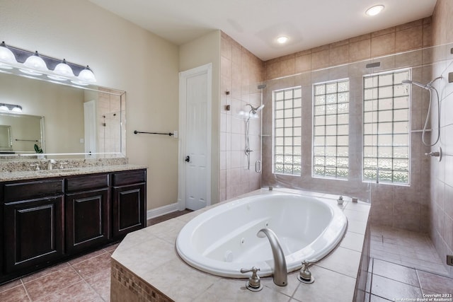 18211 Branson Fls, San Antonio, TX 78255 - bathroom with a tile shower, a tub with jets, vanity, and tile patterned floors