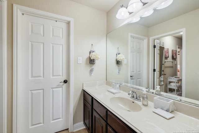 18211 Branson Fls, San Antonio, TX 78255 - bathroom featuring vanity and baseboards
