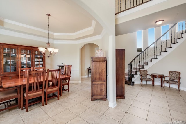18211 Branson Fls, San Antonio, TX 78255 - dining room with arched walkways, light tile patterned floors, baseboards, a chandelier, and ornamental molding