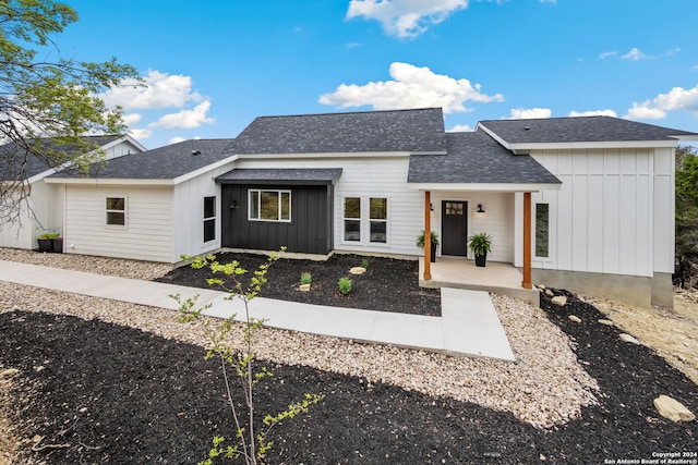410 Compass Rose, Canyon Lake, TX 78133 - modern inspired farmhouse featuring roof with shingles and board and batten siding