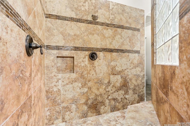 bathroom view of a tile shower and arched walkways