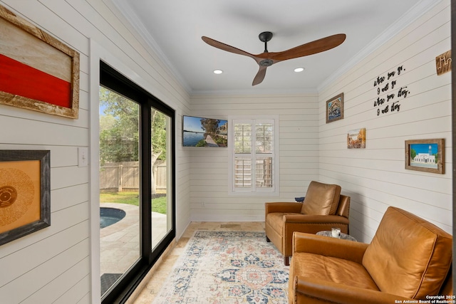 16222 Deer Crst, San Antonio, TX 78248 - living area featuring ornamental molding, a ceiling fan, wooden walls, and recessed lighting