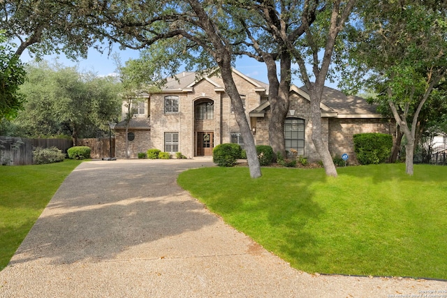 16222 Deer Crst, San Antonio, TX 78248 - view of front of property featuring brick siding, roof with shingles, and curved driveway