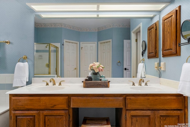 16222 Deer Crst, San Antonio, TX 78248 - bathroom with wallpapered walls, a stall shower, and double vanity