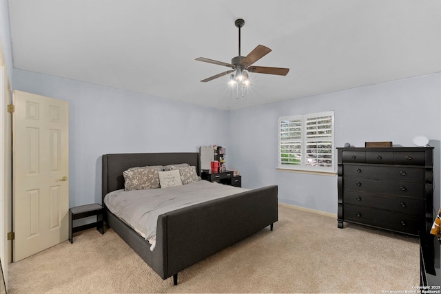 16222 Deer Crst, San Antonio, TX 78248 - bedroom with light carpet, a ceiling fan, and baseboards
