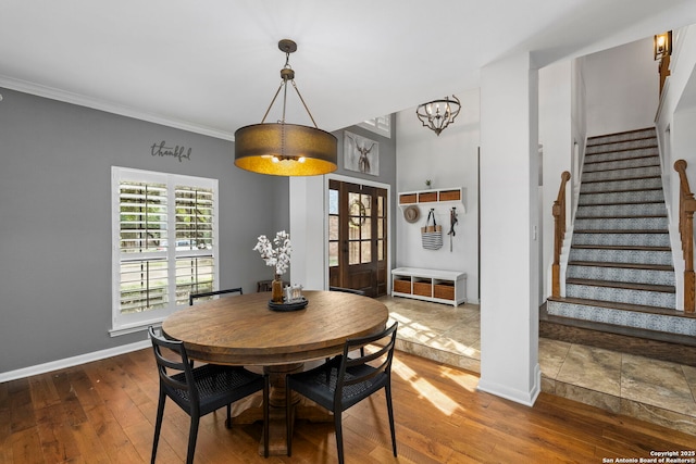 16222 Deer Crst, San Antonio, TX 78248 - dining area featuring stairway, hardwood / wood-style flooring, french doors, baseboards, and a chandelier