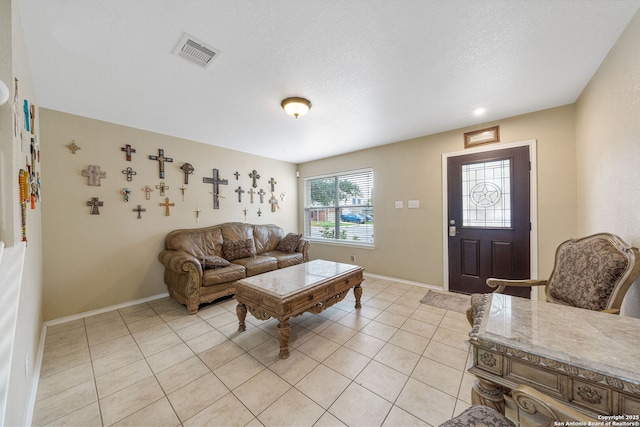 13303 Sunset Rainbow, San Antonio, TX 78245 - living area featuring light tile patterned floors and baseboards