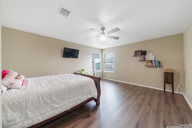 13303 Sunset Rainbow, San Antonio, TX 78245 - bedroom with wood finished floors, baseboards, and ceiling fan