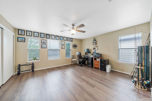 13303 Sunset Rainbow, San Antonio, TX 78245 - office area featuring ceiling fan, wood finished floors, and baseboards
