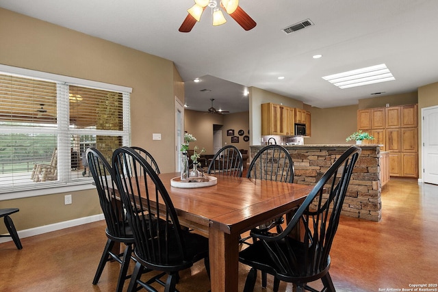 1200 Brand, Bulverde, TX 78163 - dining space featuring a ceiling fan, concrete flooring, baseboards, and recessed lighting