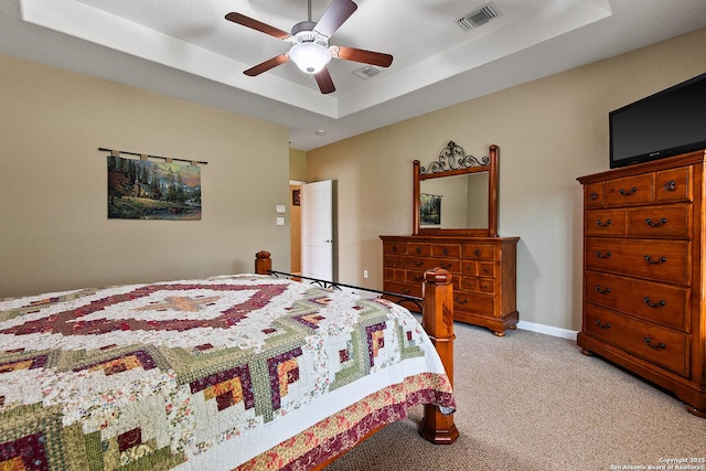 1200 Brand, Bulverde, TX 78163 - bedroom with light carpet, a tray ceiling, and a ceiling fan