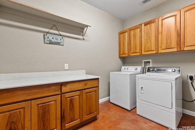 1200 Brand, Bulverde, TX 78163 - clothes washing area with cabinet space, washer and clothes dryer, and baseboards