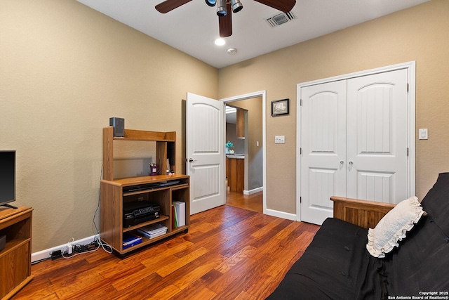 1200 Brand, Bulverde, TX 78163 - living area featuring ceiling fan, wood finished floors, and baseboards
