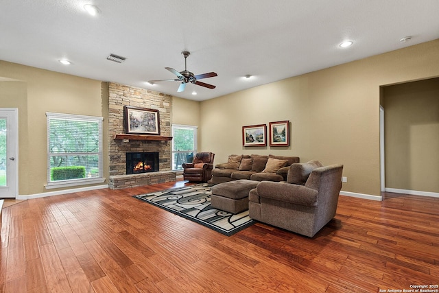 1200 Brand, Bulverde, TX 78163 - living area featuring ceiling fan, wood finished floors, a fireplace, baseboards, and recessed lighting