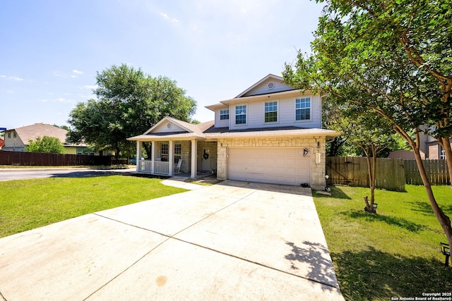 traditional-style house featuring a porch, driveway, a garage, and stone siding