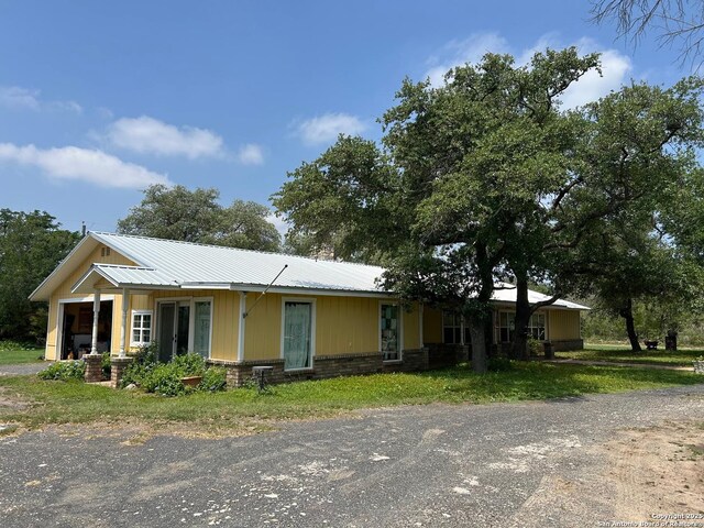 6719 State Highway 55, Uvalde, TX 78801 - single story home with metal roof