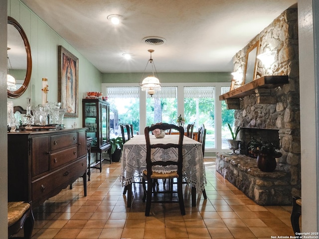 6719 State Highway 55, Uvalde, TX 78801 - dining area with light tile patterned floors and plenty of natural light