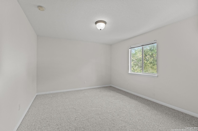 25836 Stone Cyn, San Antonio, TX 78260 - unfurnished room with carpet floors and a smoke detector