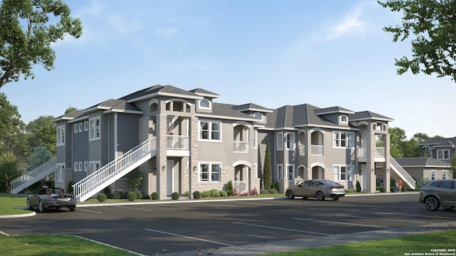 3039 View Rdg Unit 3, Spring Branch, TX 78070 - view of building exterior featuring uncovered parking and stairs