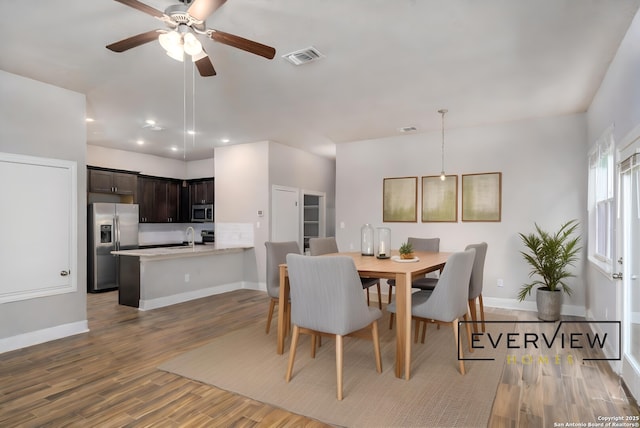 3039 View Rdg Unit 3, Spring Branch, TX 78070 - dining room featuring wood finished floors, a ceiling fan, baseboards, and recessed lighting