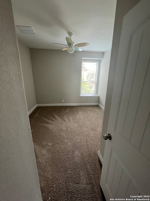 17339 Brachetto, San Antonio, TX 78247 - carpeted spare room with a ceiling fan and baseboards