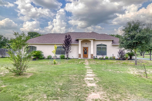 333 Studer, Uvalde, TX 78801 - single story home featuring stucco siding and roof with shingles