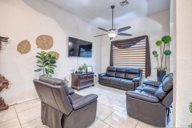 333 Studer, Uvalde, TX 78801 - living area featuring light tile patterned floors, ceiling fan, and baseboards