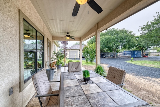 333 Studer, Uvalde, TX 78801 - view of patio with a ceiling fan, outdoor dining space, and an outdoor structure