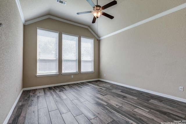 12418 Maverick Rnch, San Antonio, TX 78254 - spare room featuring ceiling fan, dark wood-style floors, lofted ceiling, and baseboards