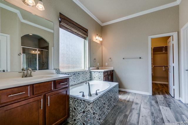12418 Maverick Rnch, San Antonio, TX 78254 - full bath with a shower stall, ornamental molding, two vanities, wood finished floors, and a bath