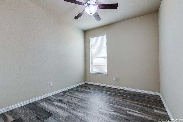 12418 Maverick Rnch, San Antonio, TX 78254 - spare room featuring dark wood finished floors, baseboards, and ceiling fan