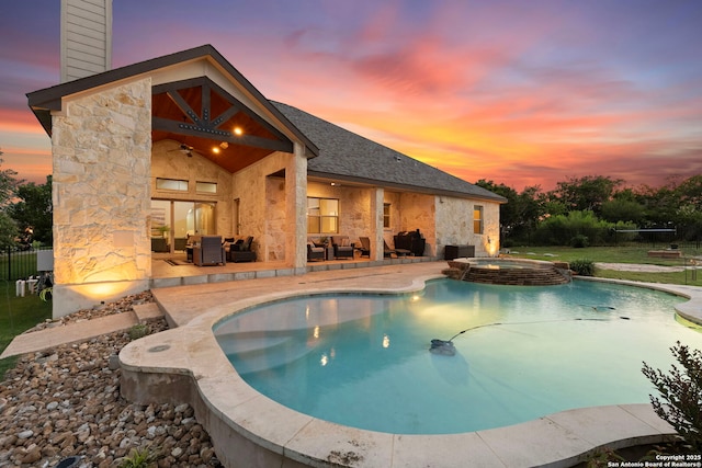 27807 San Clemente, San Antonio, TX 78260 - pool at dusk with an outdoor living space, a patio area, ceiling fan, and a pool with connected hot tub