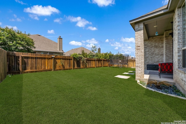 9759 Kremmen, Boerne, TX 78006 - view of yard featuring a trampoline