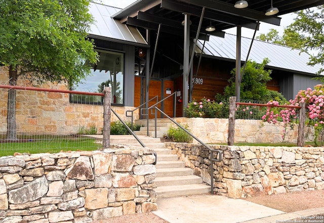 9759 Kremmen, Boerne, TX 78006 - view of exterior entry featuring metal roof and fence