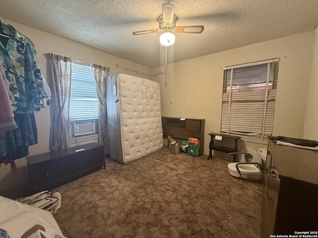 318 Uvalde, San Antonio, TX 78210 - bedroom with a textured ceiling, carpet floors, and a ceiling fan